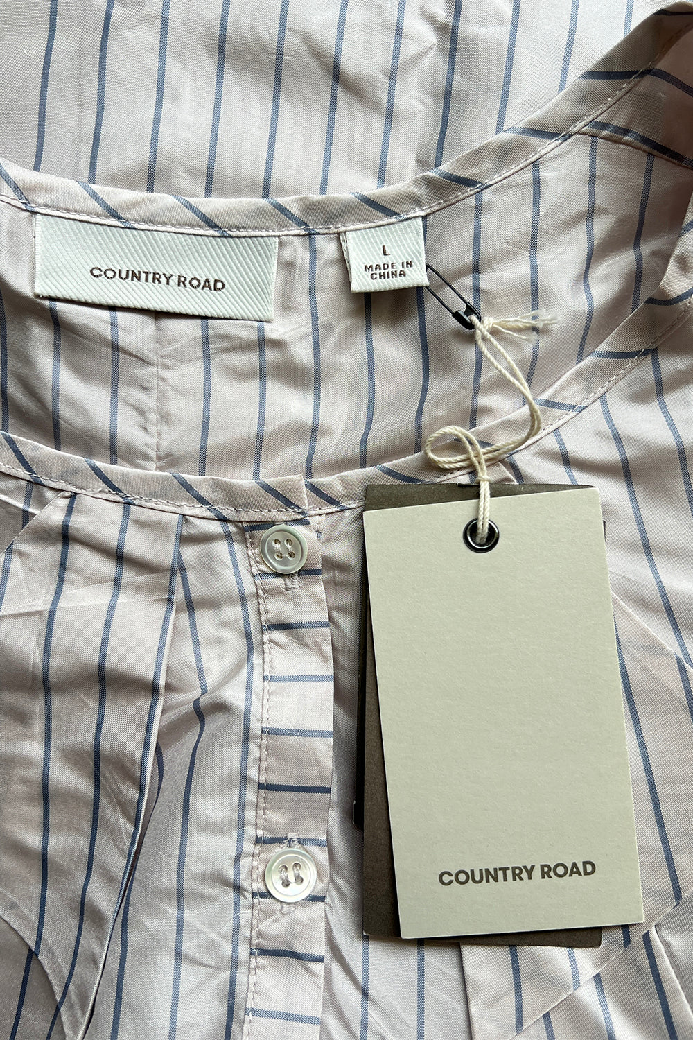 Country Road Pale Shell Top