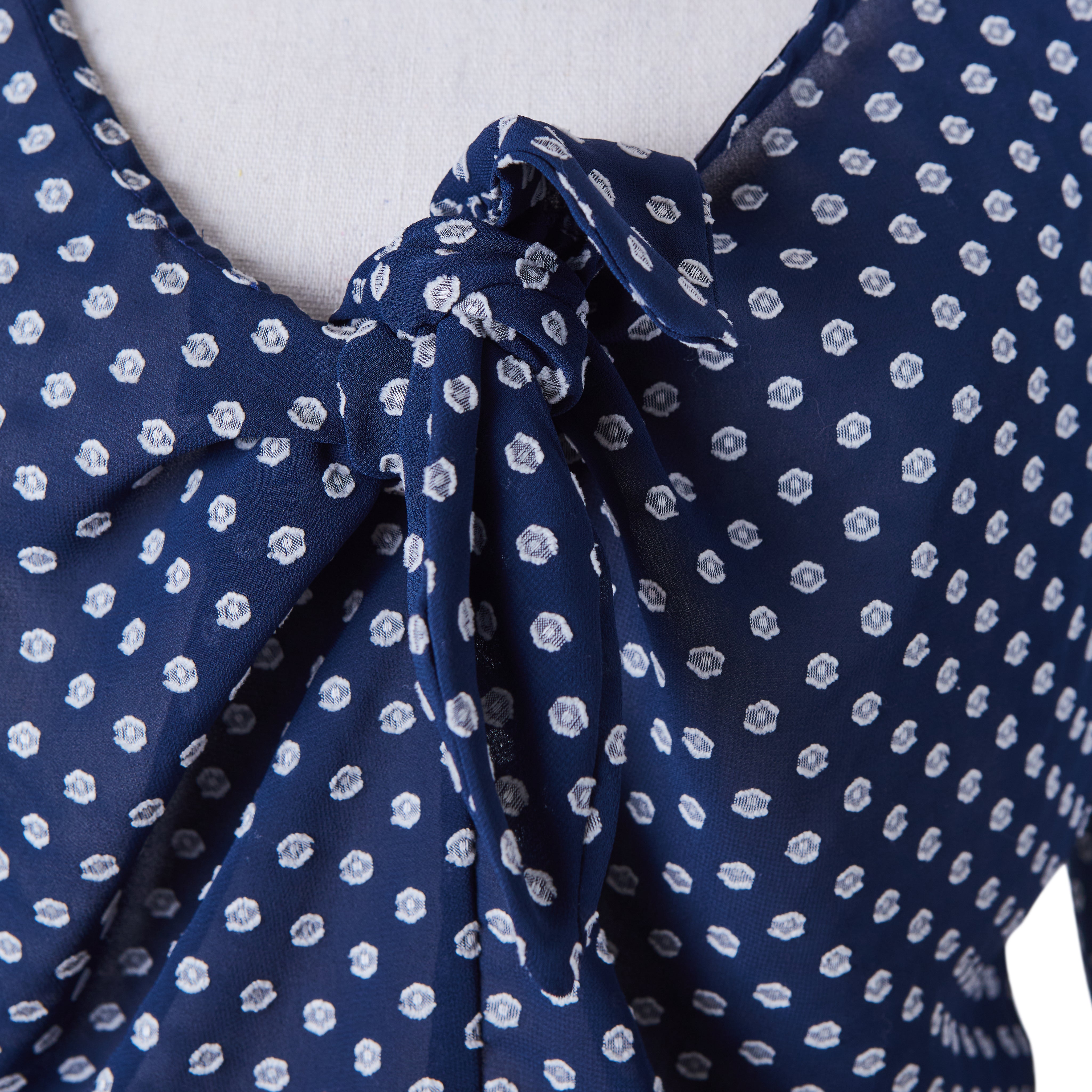 KOOKAI Navy White Spot Flocked tie front blouse