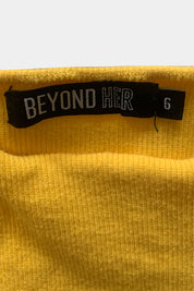 Beyond Her Yellow Top