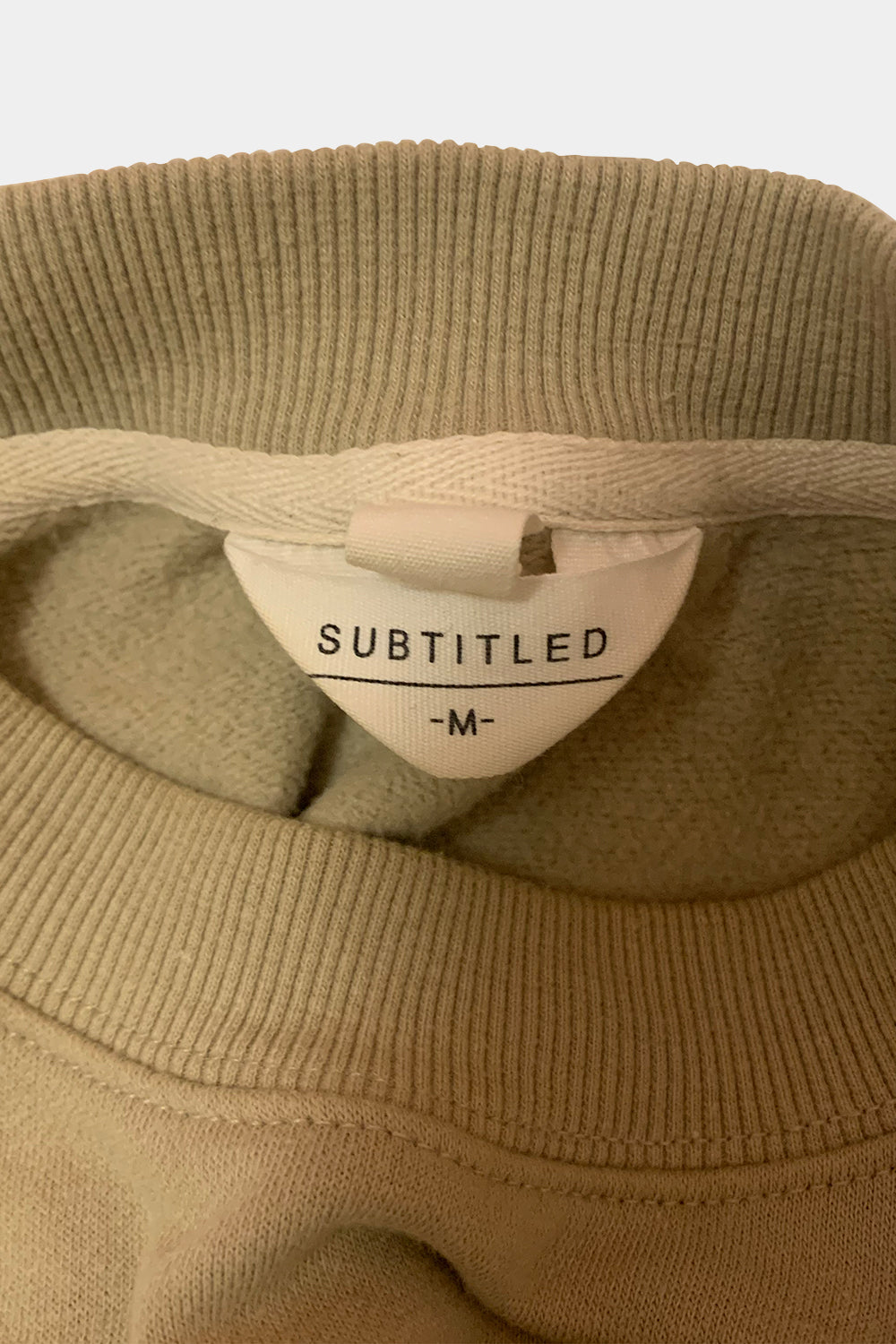 SUBTITLED Khaki Jumper
